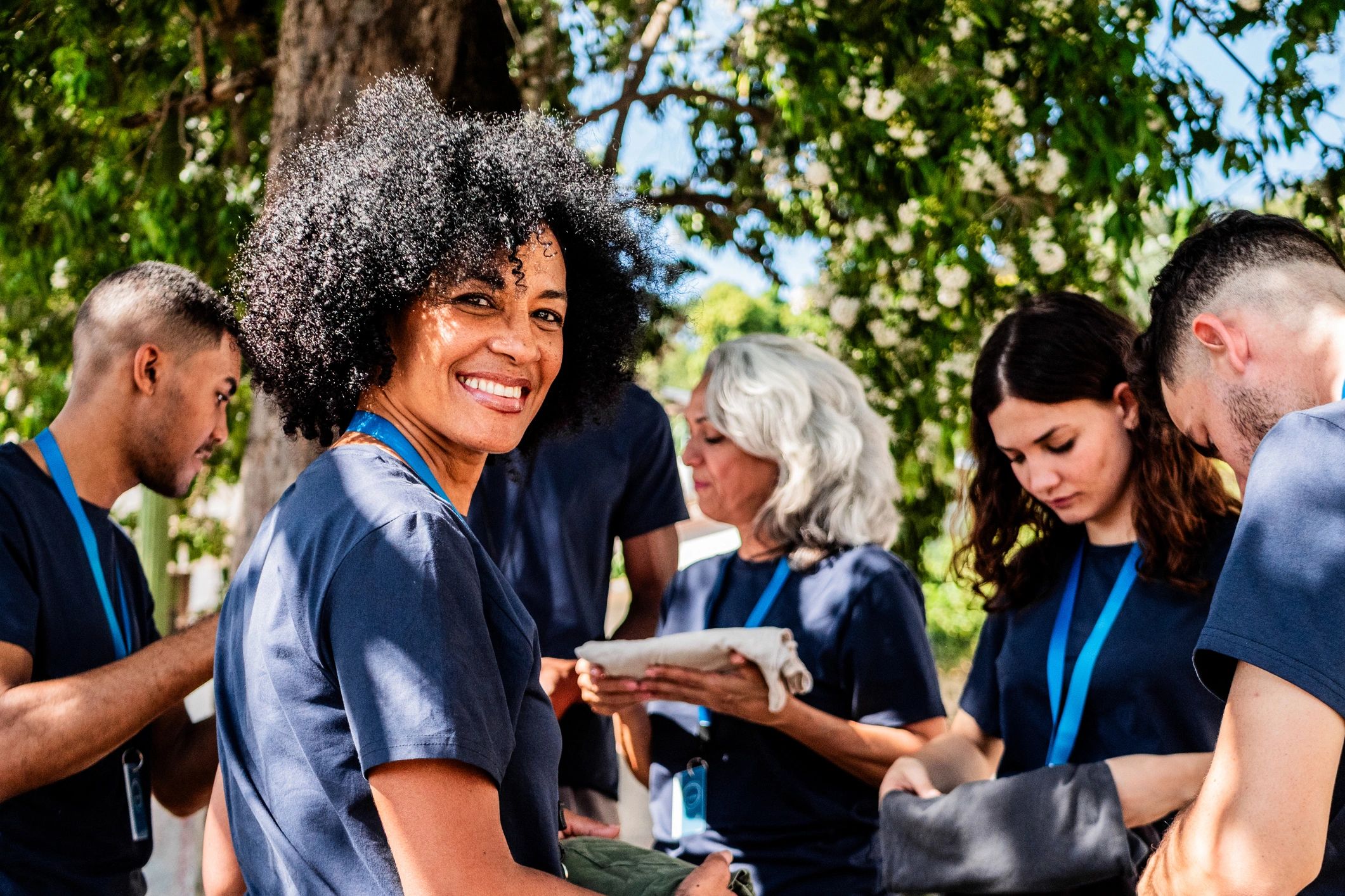 Community members at an outdoor gathering